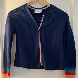 Mini Boden navy cardigan with rainbow accents on sleeves, size 9-10y